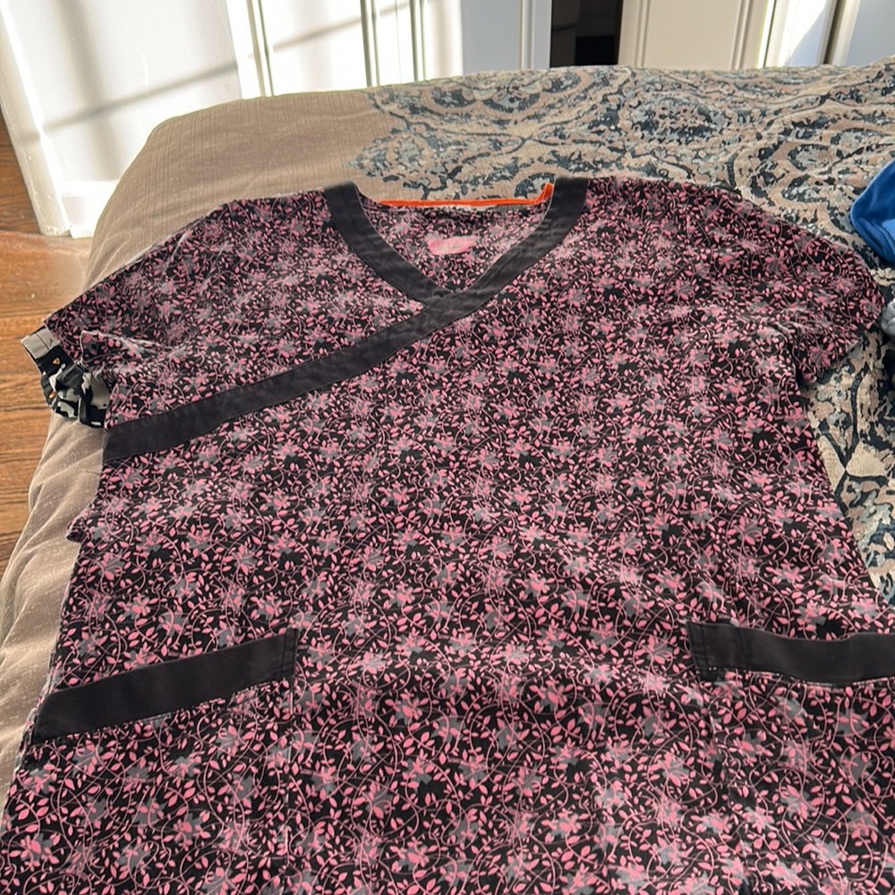 Black, grey and pink scrub top with drawstring with and two pockets
